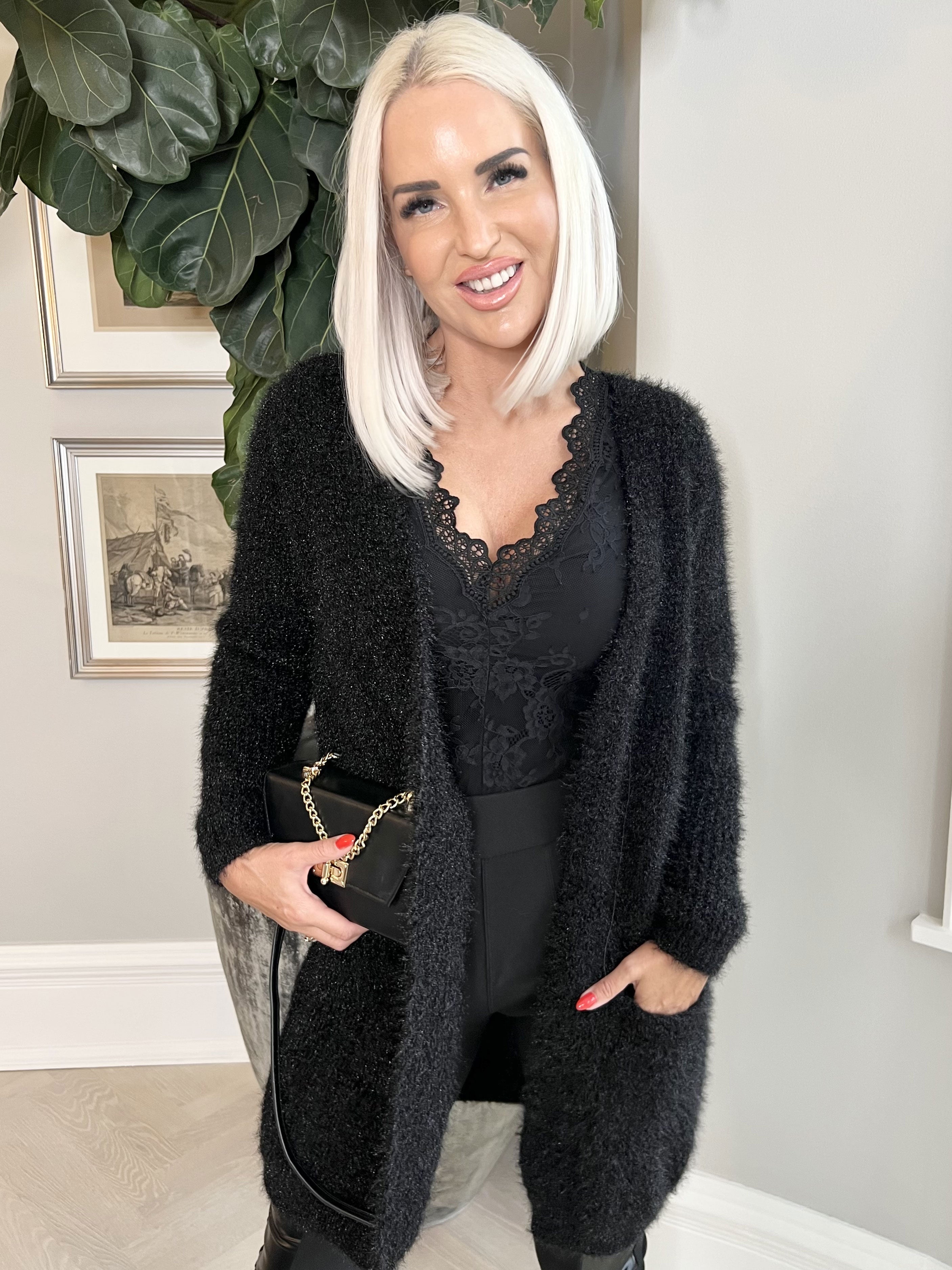 Levy - Fluffy cardigan med lommer